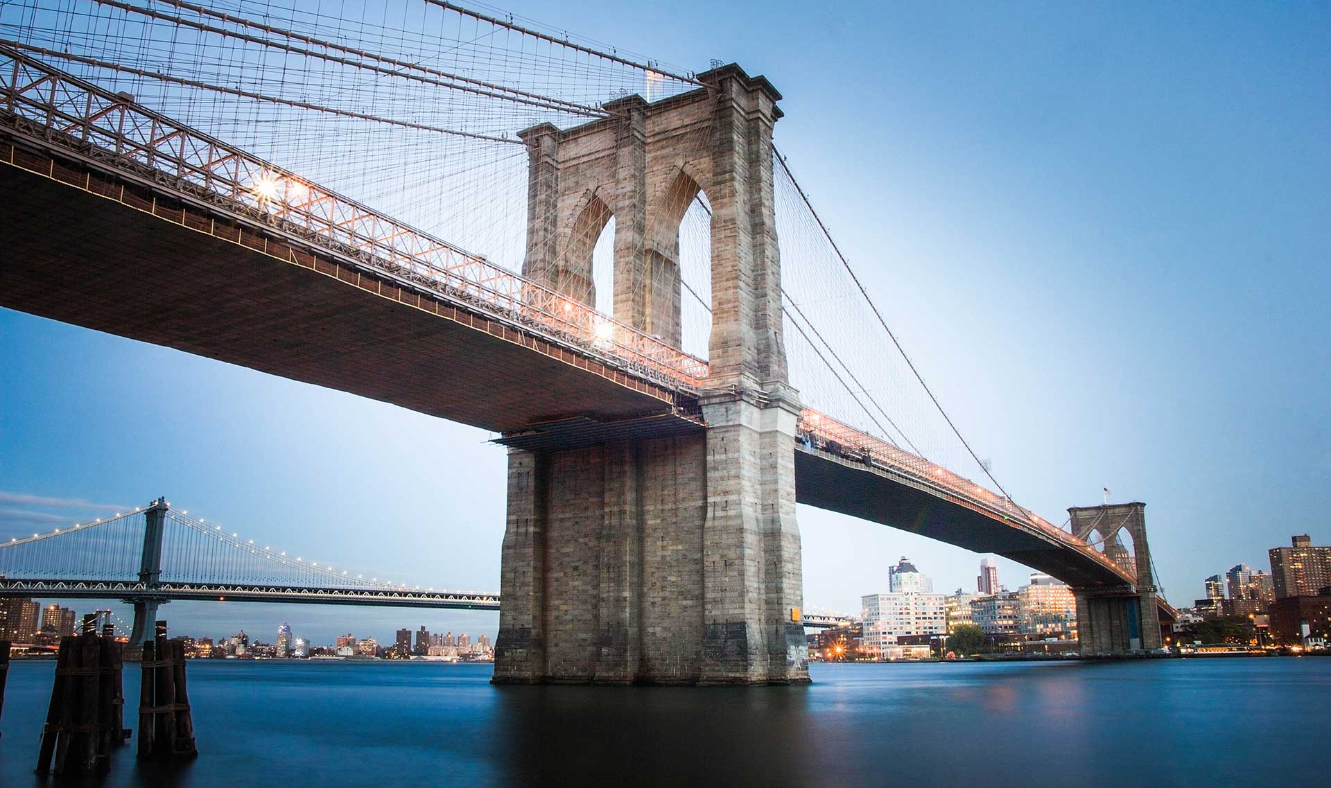the Brooklyn Bridge in the day time